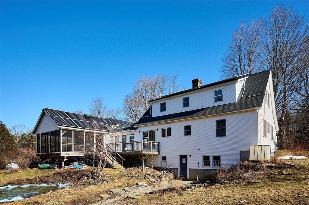 63 Old Post Road Worthington, MA 01098 - Photo 5 of 40 a view of a yard in front of a house