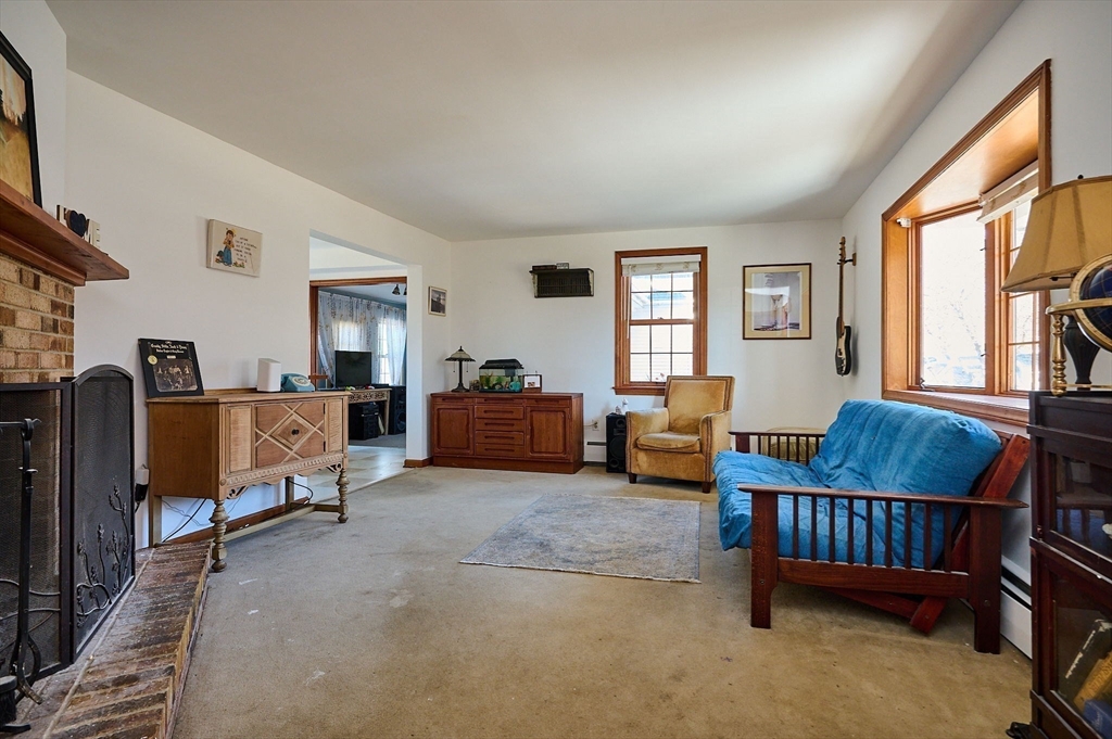 63 Old Post Road Worthington, MA 01098 - Photo 8 of 40 a living room with furniture and a window