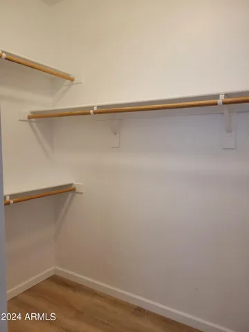 a view of a room with racks on the wall