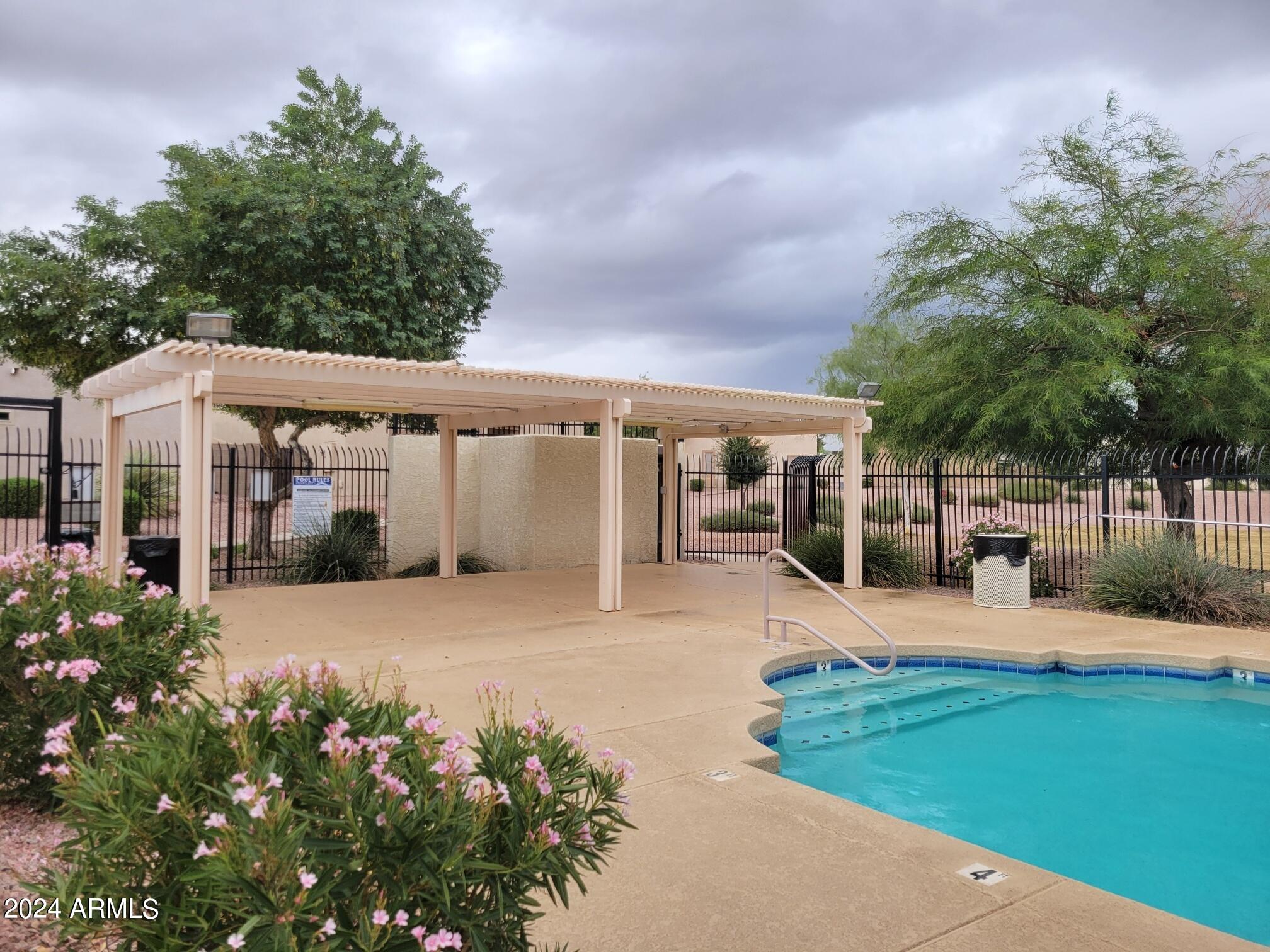 2300 East Magma Road, Unit 170 San Tan Valley, AZ 85143 - Photo 22 of 22 a front view of a house with yard and green space