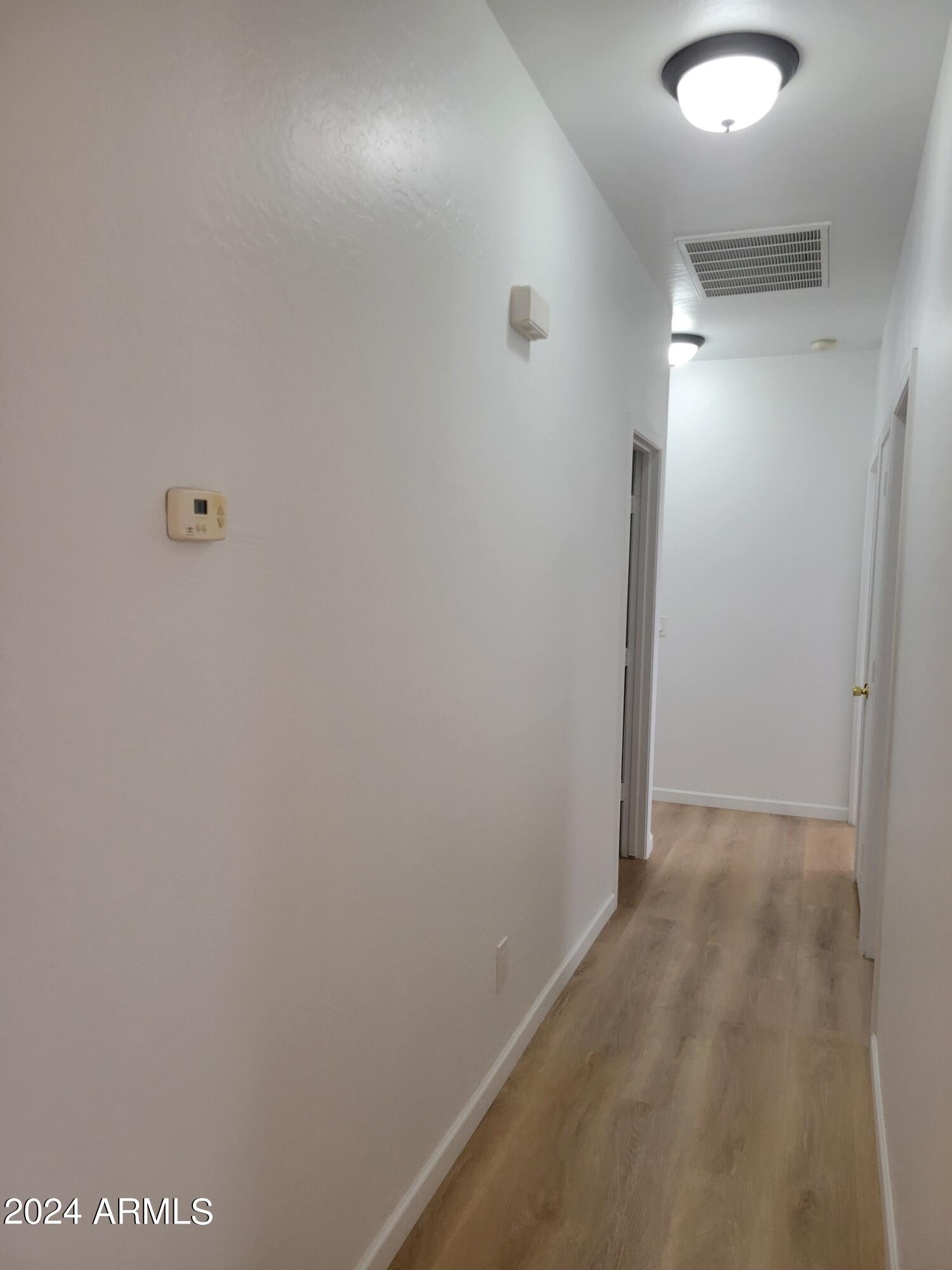 2300 East Magma Road, Unit 170 San Tan Valley, AZ 85143 - Photo 10 of 22 a view of hallway with closet