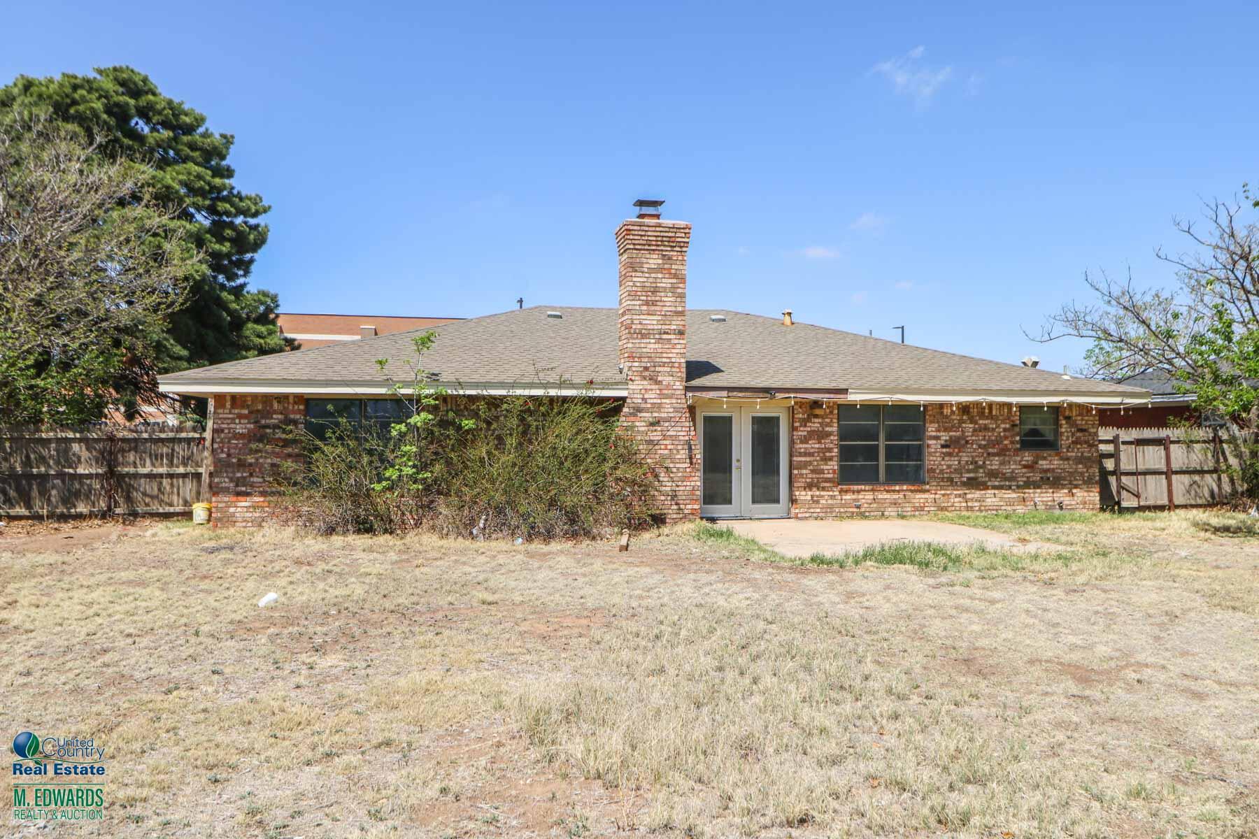 705 West Virginia Street Floydada, TX 79235 - Photo 15 of 15 a front view of a house with a yard