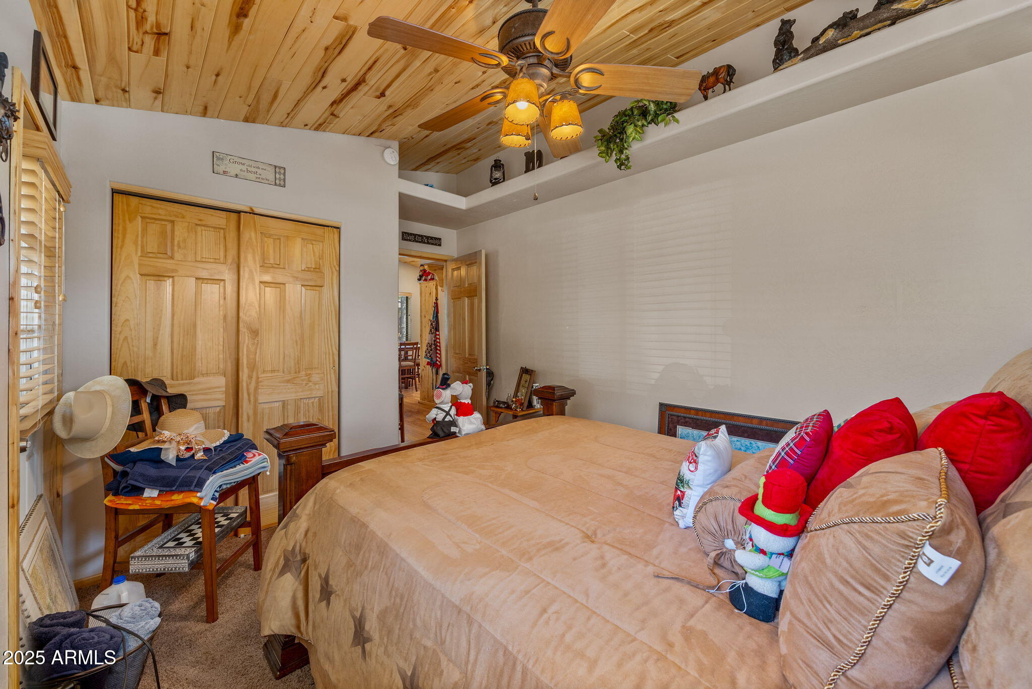 2979 Western Star Drive Overgaard, AZ 85933 - Photo 14 of 29 a bedroom with a bed and a window