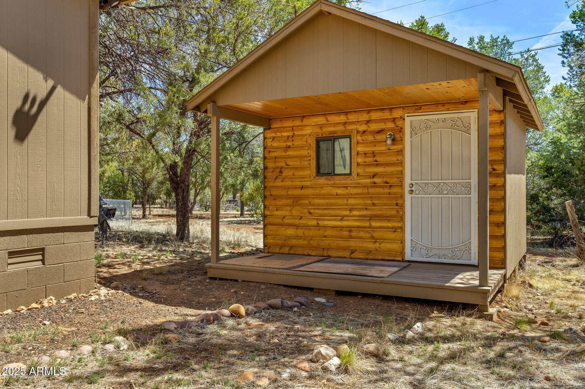 2979 Western Star Drive Overgaard, AZ 85933 - Photo 20 of 29 a view of a house with a yard