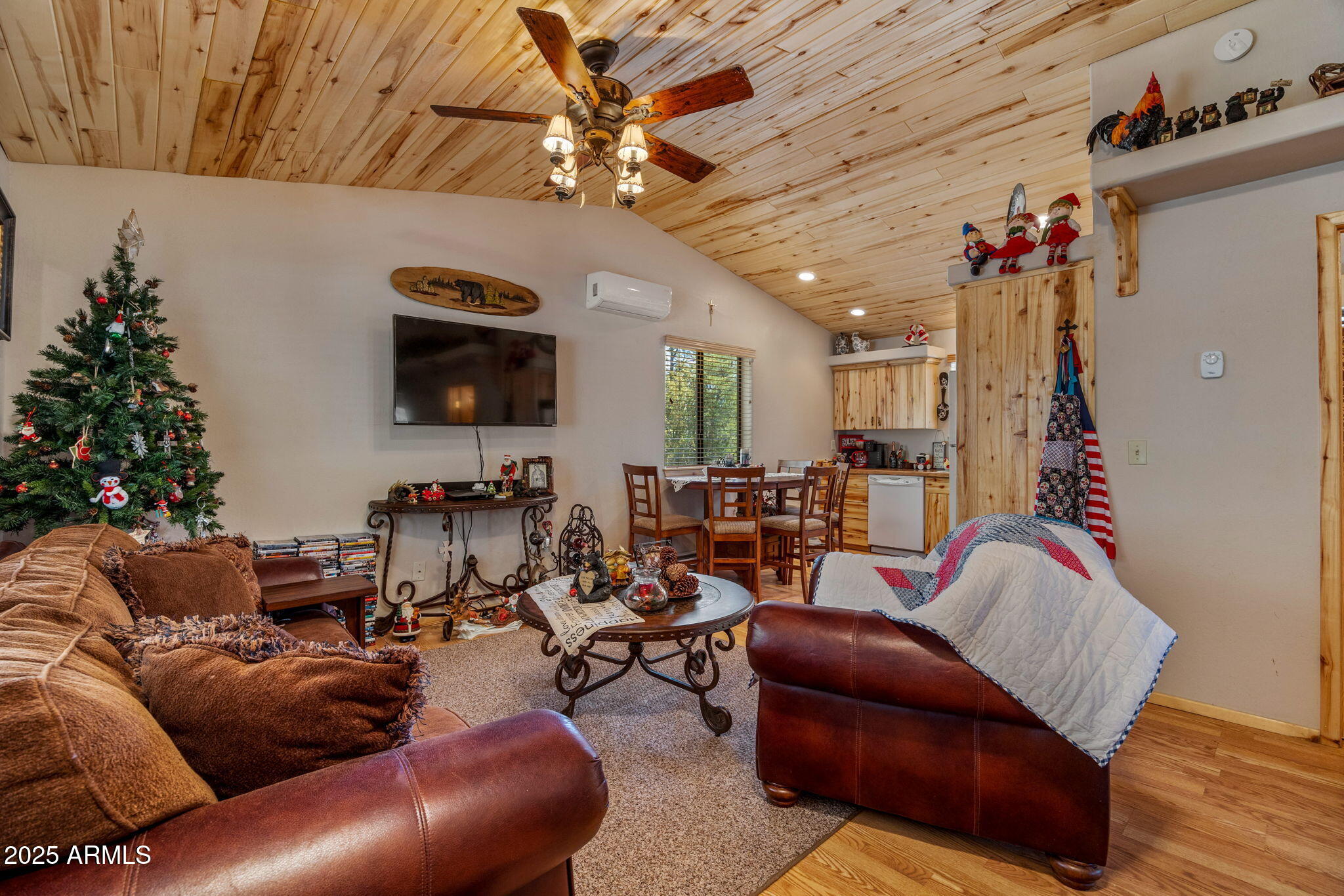 2979 Western Star Drive Overgaard, AZ 85933 - Photo 6 of 29 a living room with furniture and a flat screen tv