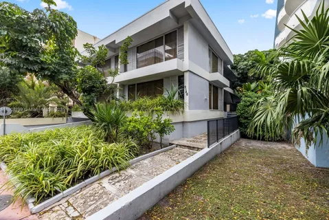a house view with a outdoor space