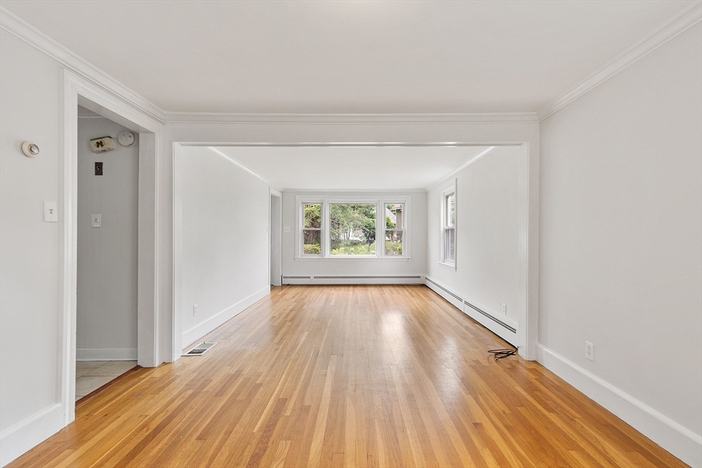 32 Pond Street Gardner, MA 01440 - Photo 14 of 34 wooden floor in an empty room with a window