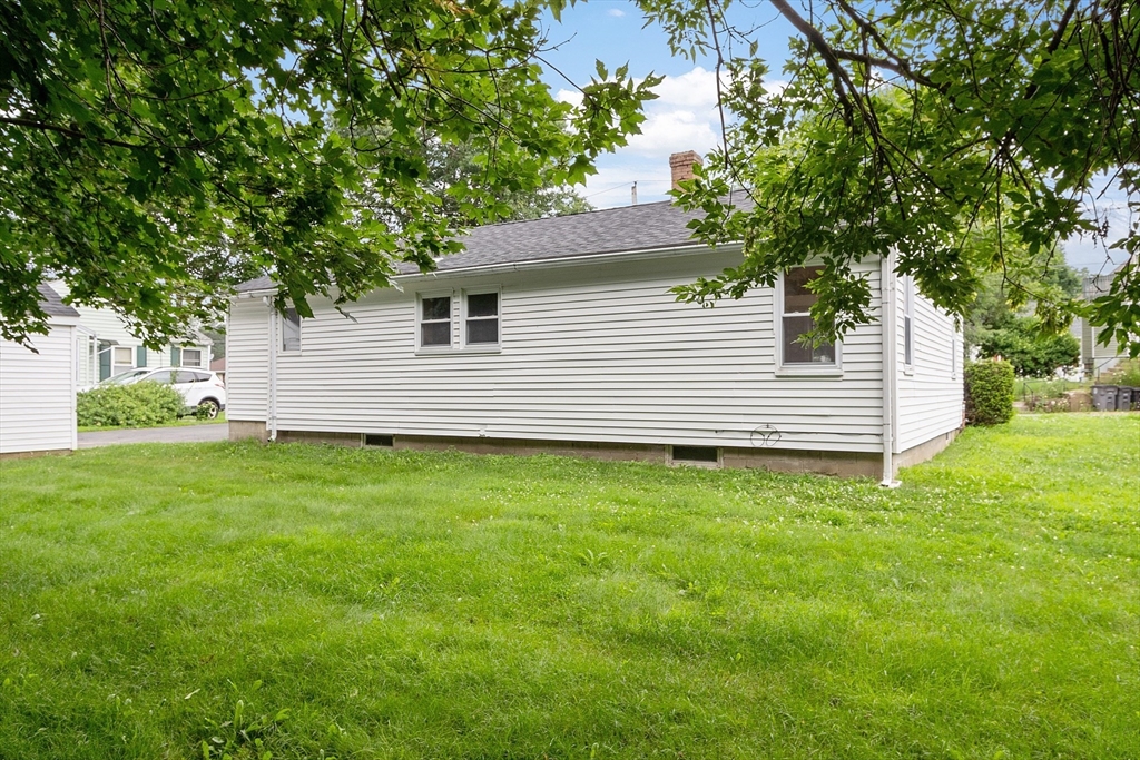 32 Pond Street Gardner, MA 01440 - Photo 2 of 34 a front view of a house with a garden