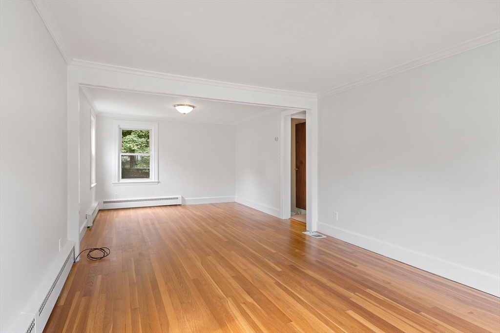 32 Pond Street Gardner, MA 01440 - Photo 21 of 34 wooden floor in an empty room with a window