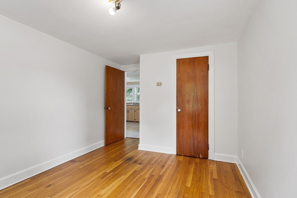 32 Pond Street Gardner, MA 01440 - Photo 29 of 34 a view of an empty room with wooden floor