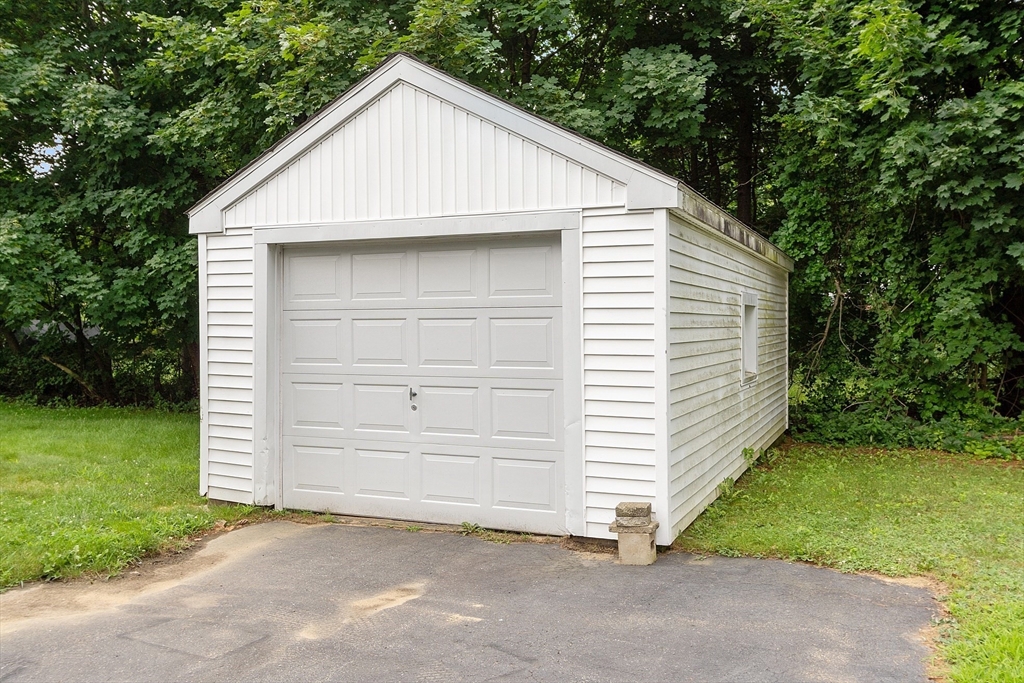 32 Pond Street Gardner, MA 01440 - Photo 3 of 34 a view of a small house with a garage