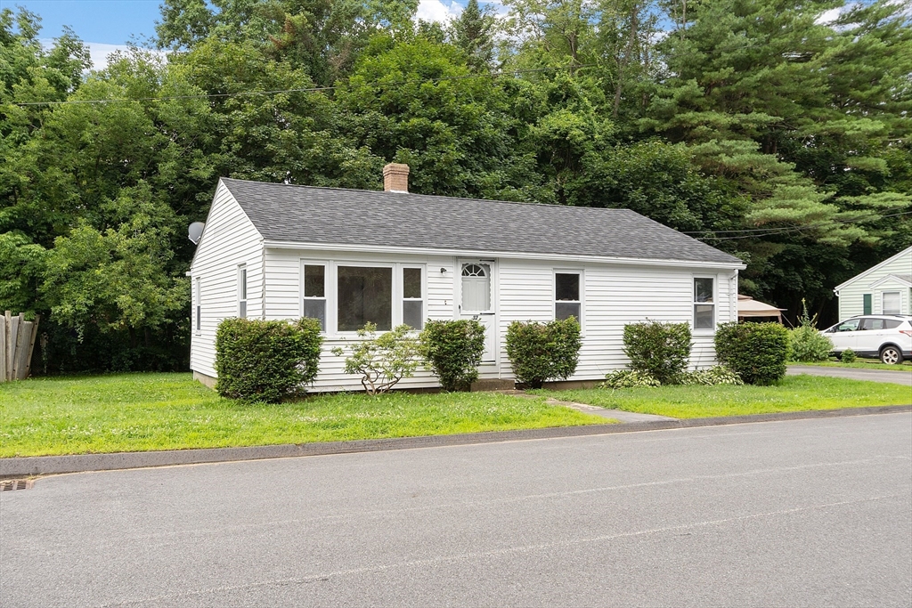 32 Pond Street Gardner, MA 01440 - Photo 32 of 34 a front view of a house with a yard and garage