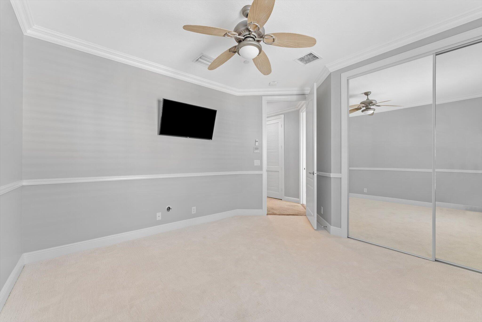 604 Northeast Francesca Lane Boca Raton, FL 33487 - Photo 27 of 55 a view of a livingroom with a ceiling fan