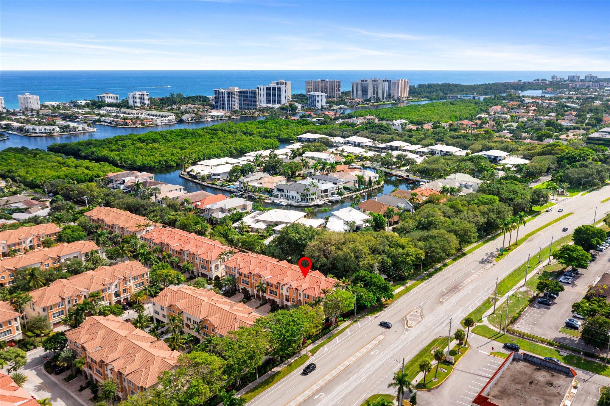 604 Northeast Francesca Lane Boca Raton, FL 33487 - Photo 49 of 55 an aerial view of residential houses with yard and lake view