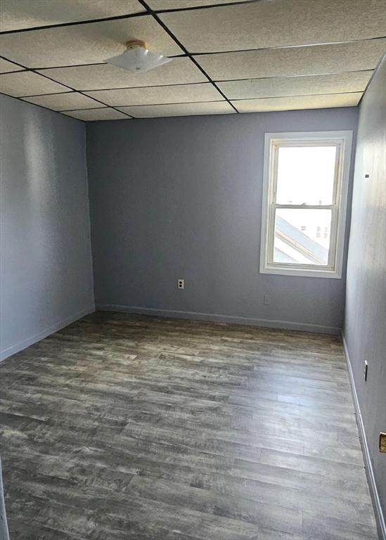 111 Covel Street, Unit 3 Fall River, MA 02723 - Photo 8 of 11 a view of an empty room with a window