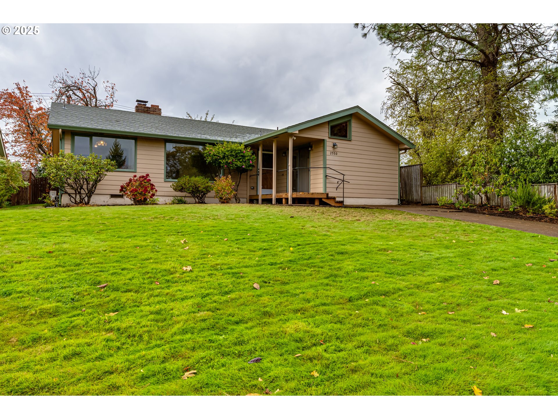 2550 Lawrence Street Eugene, OR 97405 - Photo 1 of 48 a view of a house with a backyard