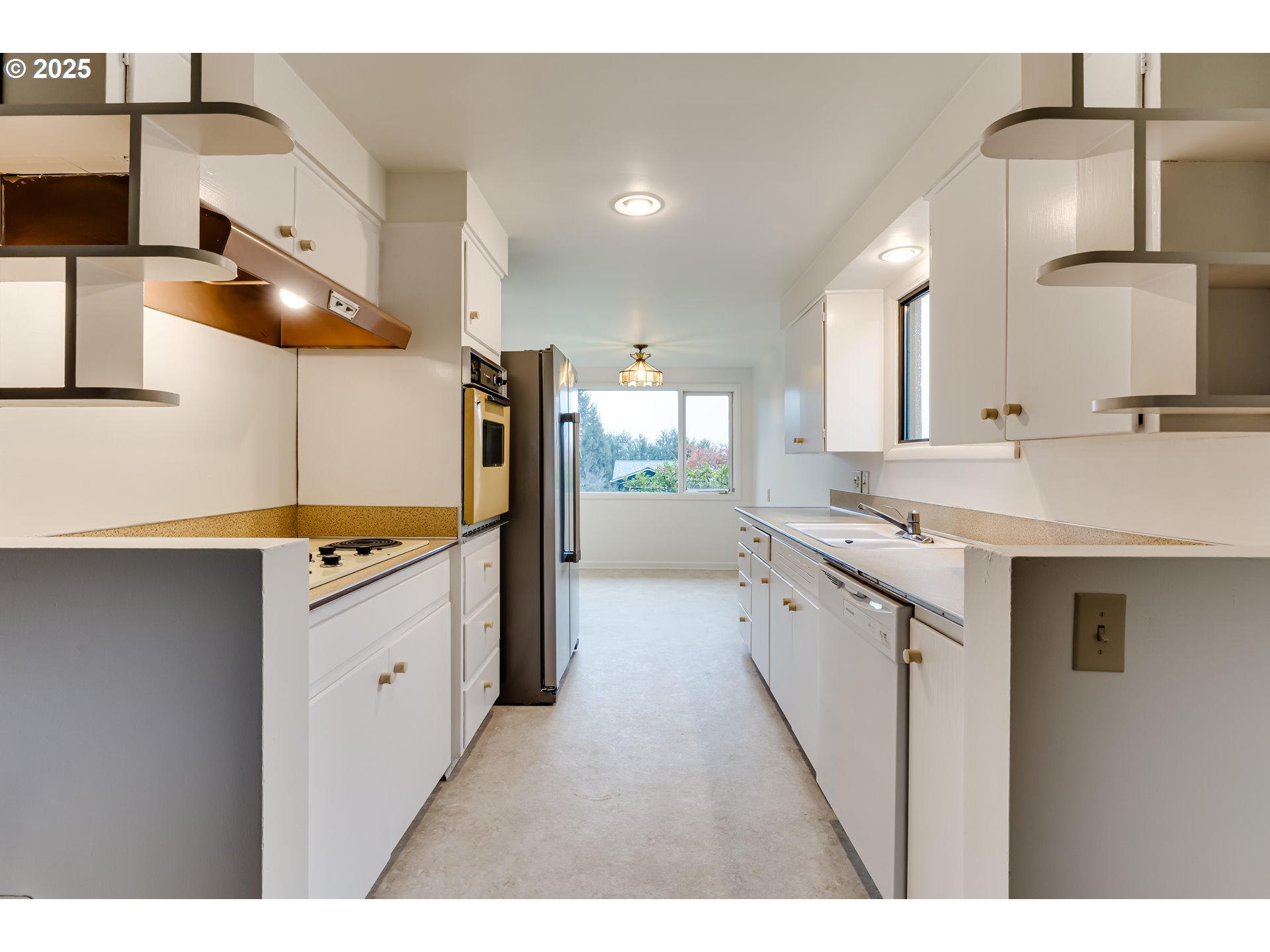 2550 Lawrence Street Eugene, OR 97405 - Photo 16 of 48 a large kitchen with a sink and dishwasher
