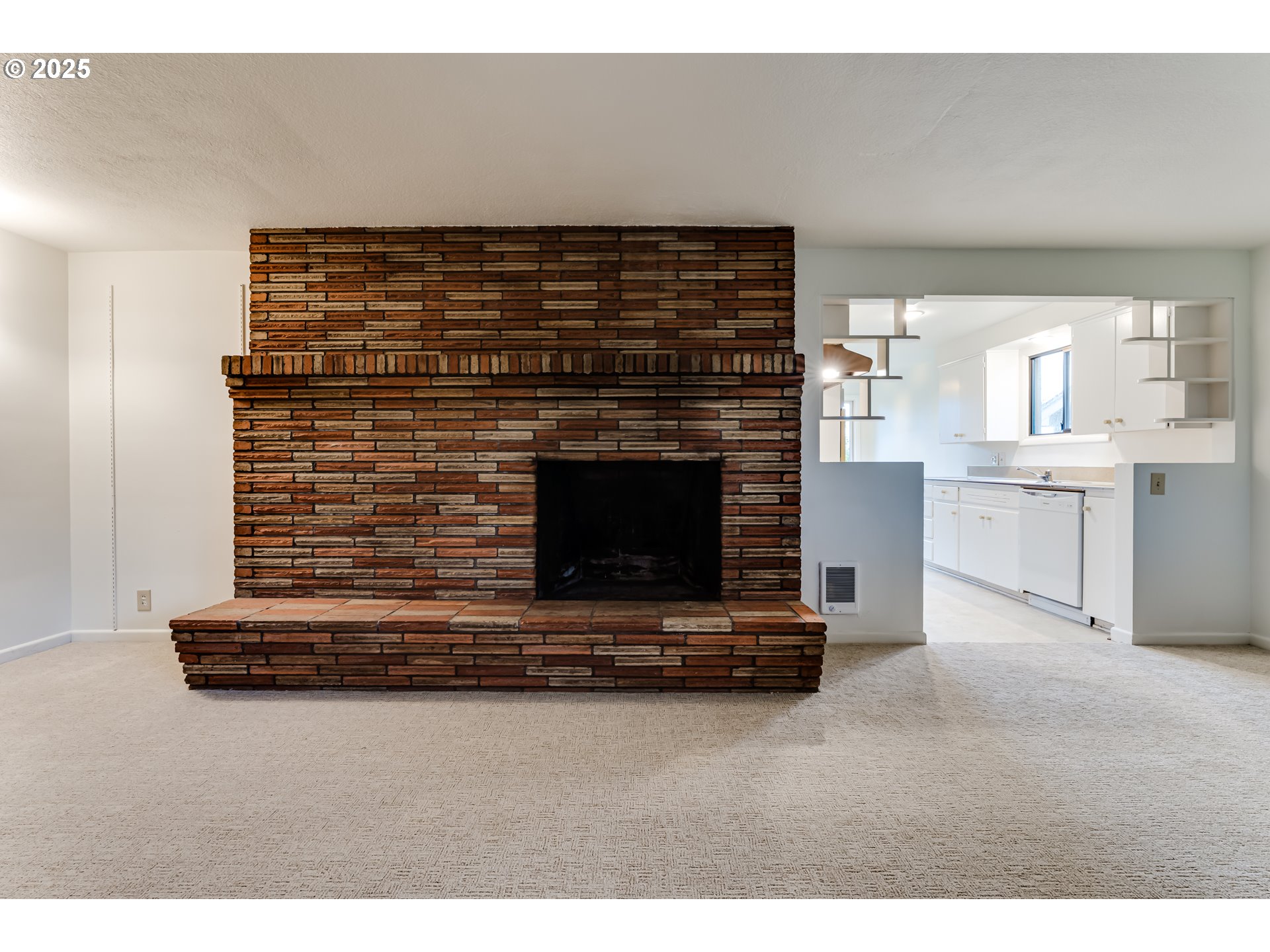 2550 Lawrence Street Eugene, OR 97405 - Photo 21 of 48 a living room with furniture and a fireplace