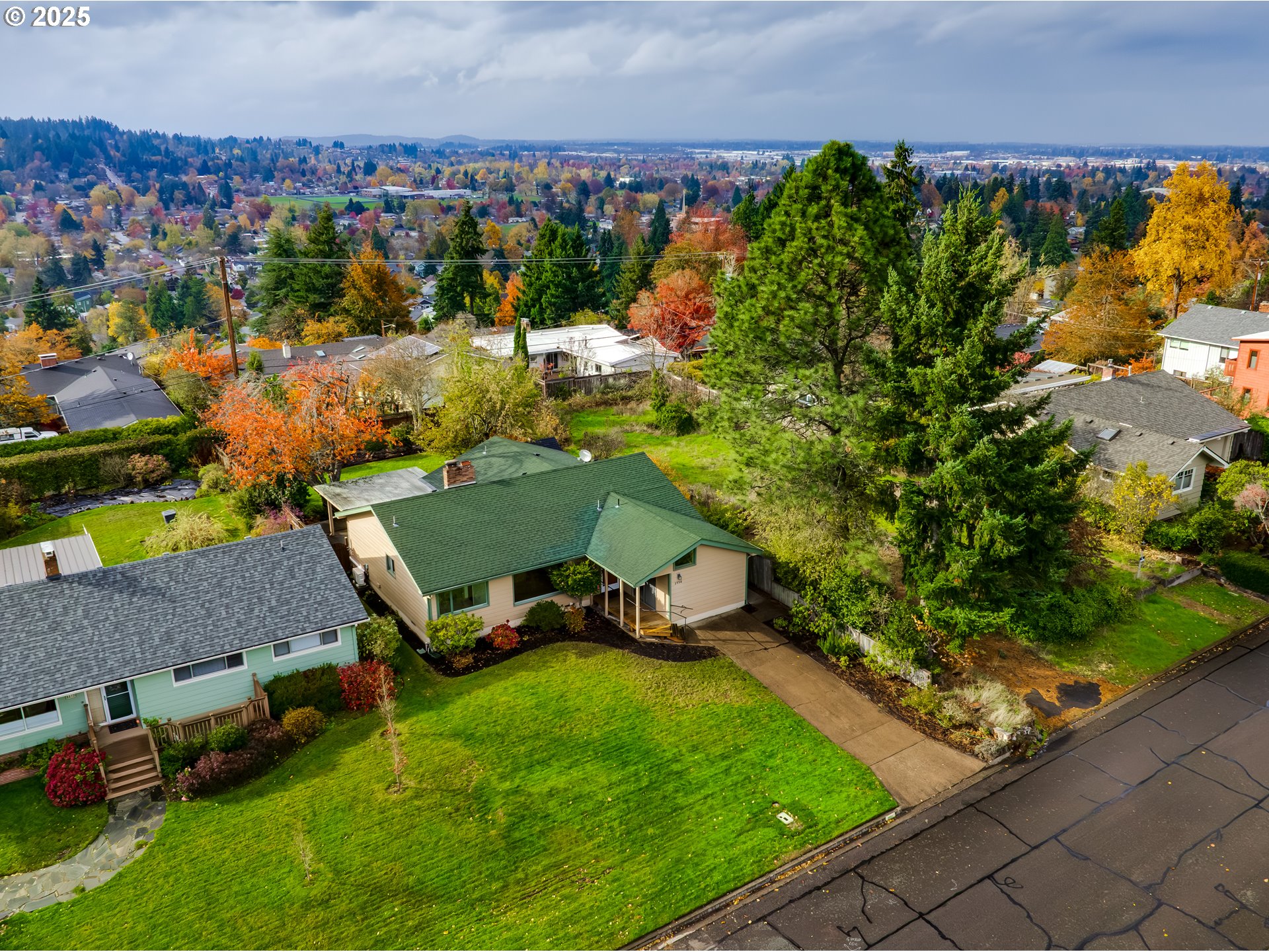 2550 Lawrence Street Eugene, OR 97405 - Photo 3 of 48 an aerial view of a backyard with swimming pool and outdoor seating