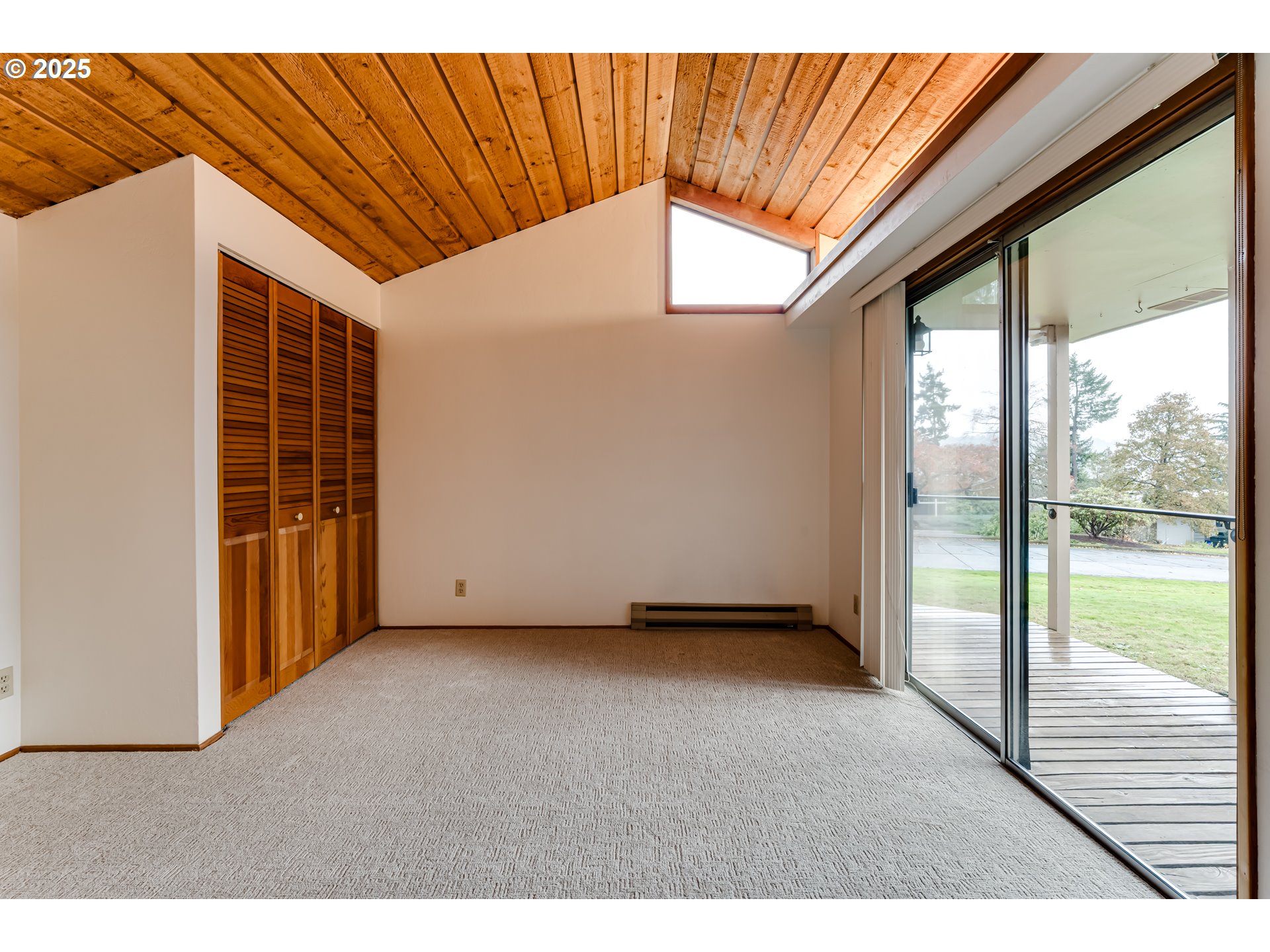 2550 Lawrence Street Eugene, OR 97405 - Photo 35 of 48 a view of an empty room with a sliding door