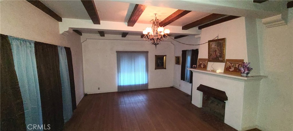 311 Montechico Drive Monterey Park, CA 91754 - Photo 3 of 73 Living room with beam ceiling and fireplace.