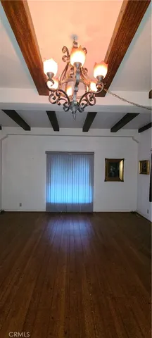 a room with window and furniture