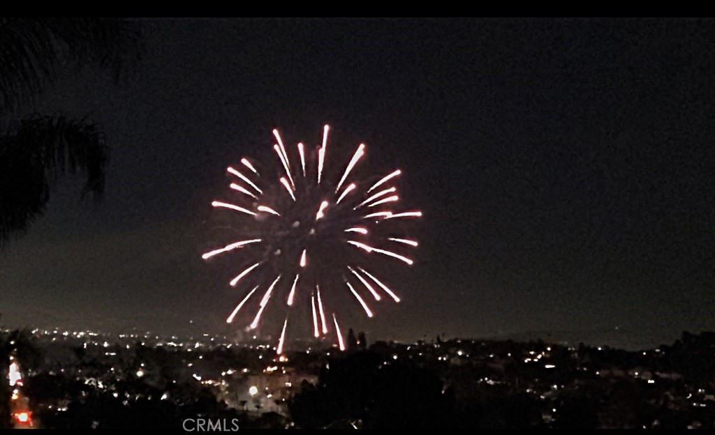 311 Montechico Drive Monterey Park, CA 91754 - Photo 61 of 73 Annual Barnes Park fireworks display enjoyed from garage deck.
