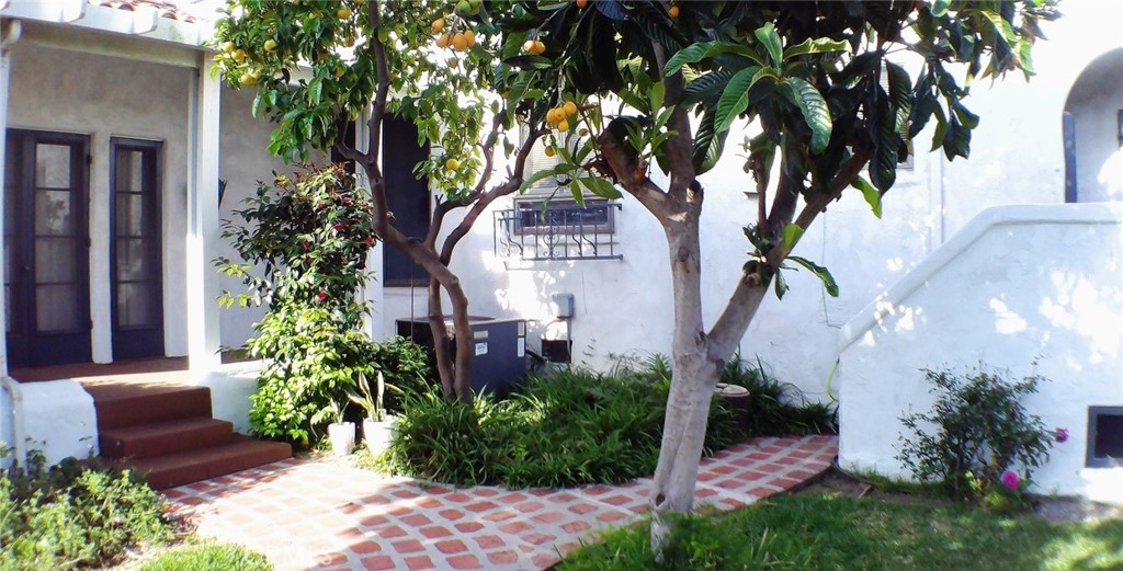 311 Montechico Drive Monterey Park, CA 91754 - Photo 70 of 73 a front view of a house with garden