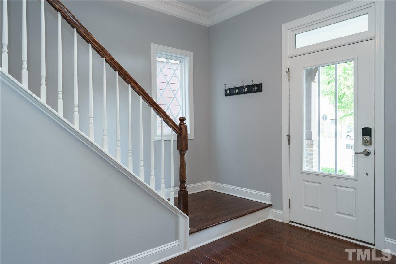 1334 Rodessa Run Raleigh, NC 27607 - Photo 3 of 25 a view of an entryway with wooden floor