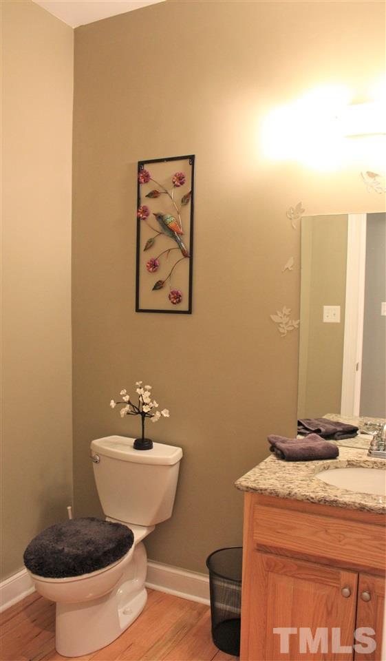 288 North Old Lantern Road Timberlake, NC 27583 - Photo 18 of 20 a bathroom with a toilet and a sink