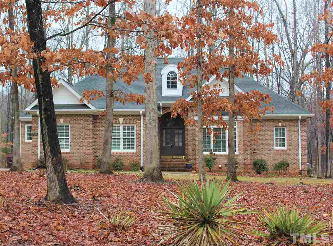 288 North Old Lantern Road Timberlake, NC 27583 - Photo 20 of 20 a view of a house with a tree in the yard
