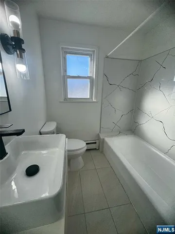 a bathroom with a sink and a tub