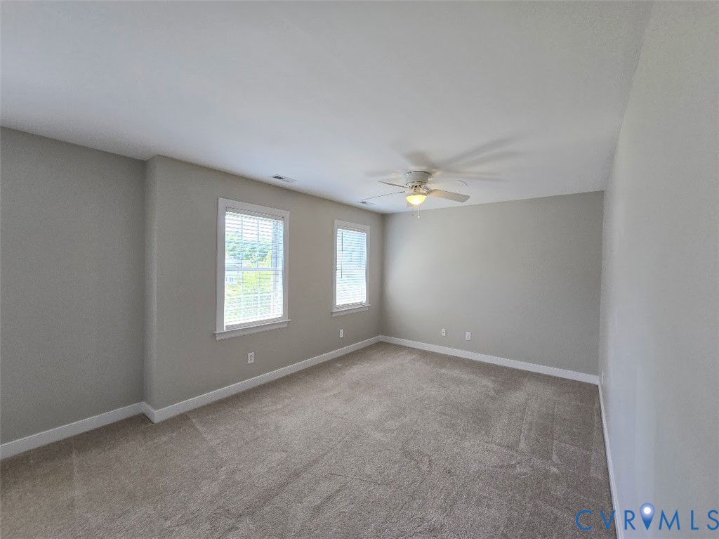 16406 Benmore Road Moseley, VA 23120 - Photo 19 of 32 a view of an empty room with a window