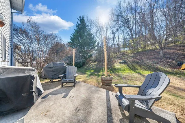 a view of a park with iron fence