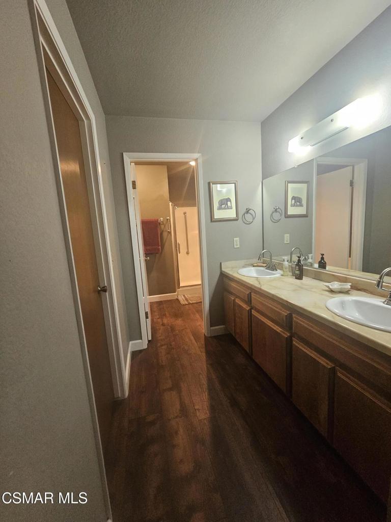 4997 Shadow Canyon Road Templeton, CA 93465 - Photo 12 of 18 a bathroom with a sink a mirror and a shower