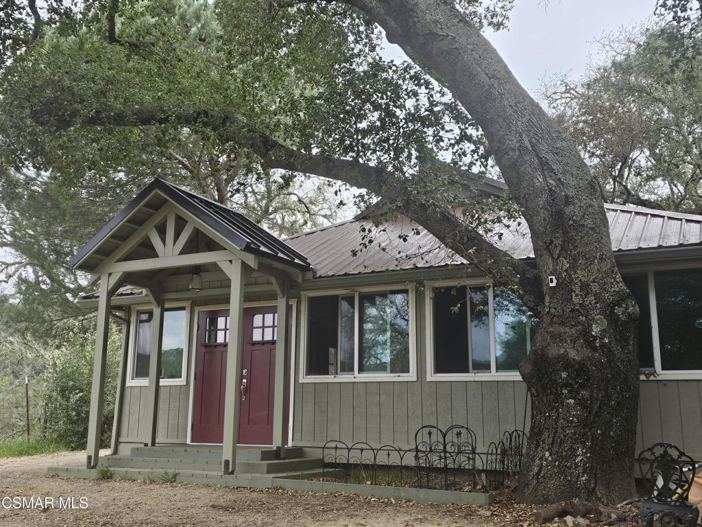 4997 Shadow Canyon Road Templeton, CA 93465 - Photo 2 of 18 a front view of a house with garden