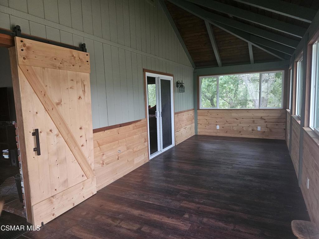 4997 Shadow Canyon Road Templeton, CA 93465 - Photo 5 of 18 a view of a hallway with wooden floor and staircase