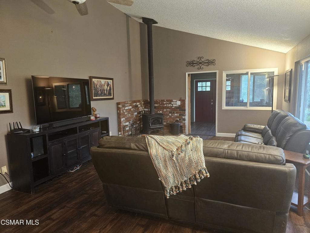 4997 Shadow Canyon Road Templeton, CA 93465 - Photo 6 of 18 a living room with furniture and a flat screen tv