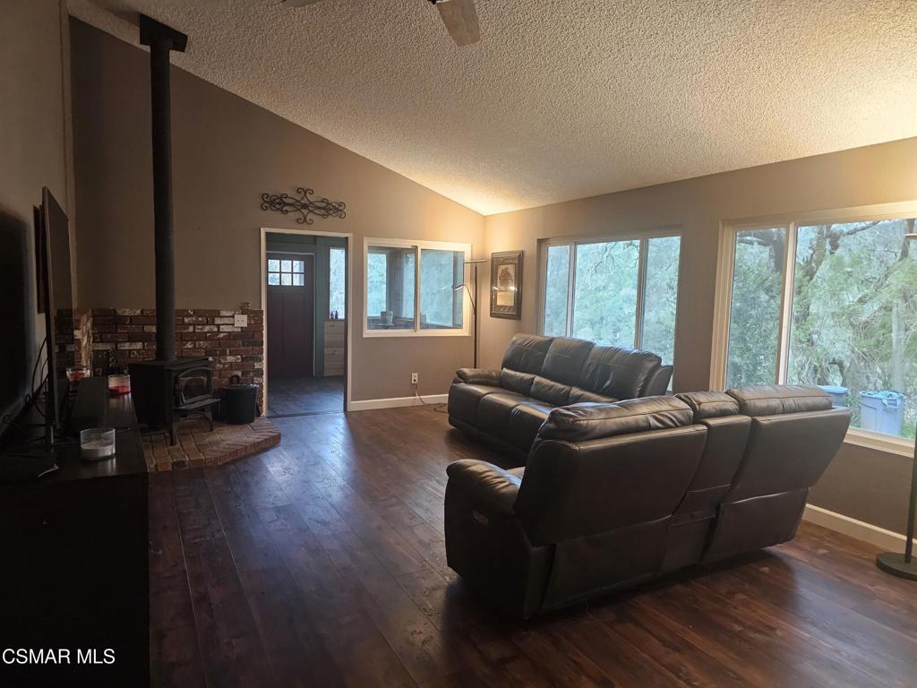 4997 Shadow Canyon Road Templeton, CA 93465 - Photo 7 of 18 a living room with furniture and a wooden floor