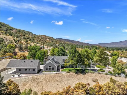 a view of a house with a mountain