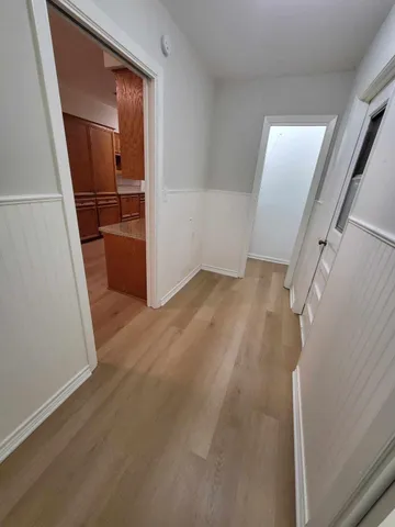 a view of a cabinet and mirror