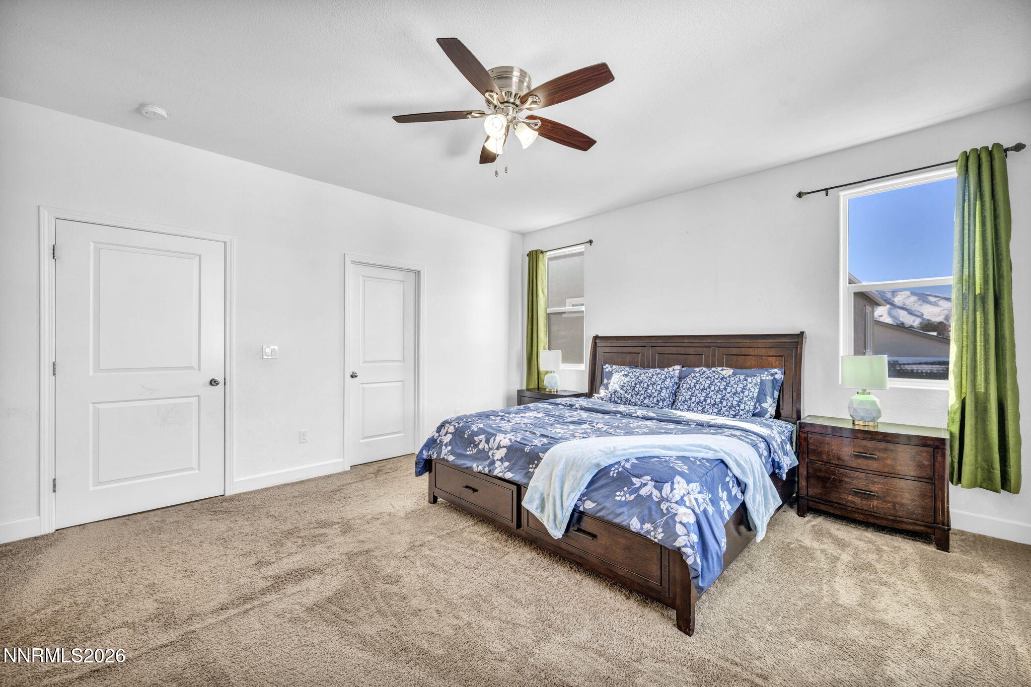 969 Estuary Circle Reno, NV 89506 - Photo 18 of 38 a bedroom with a bed and window