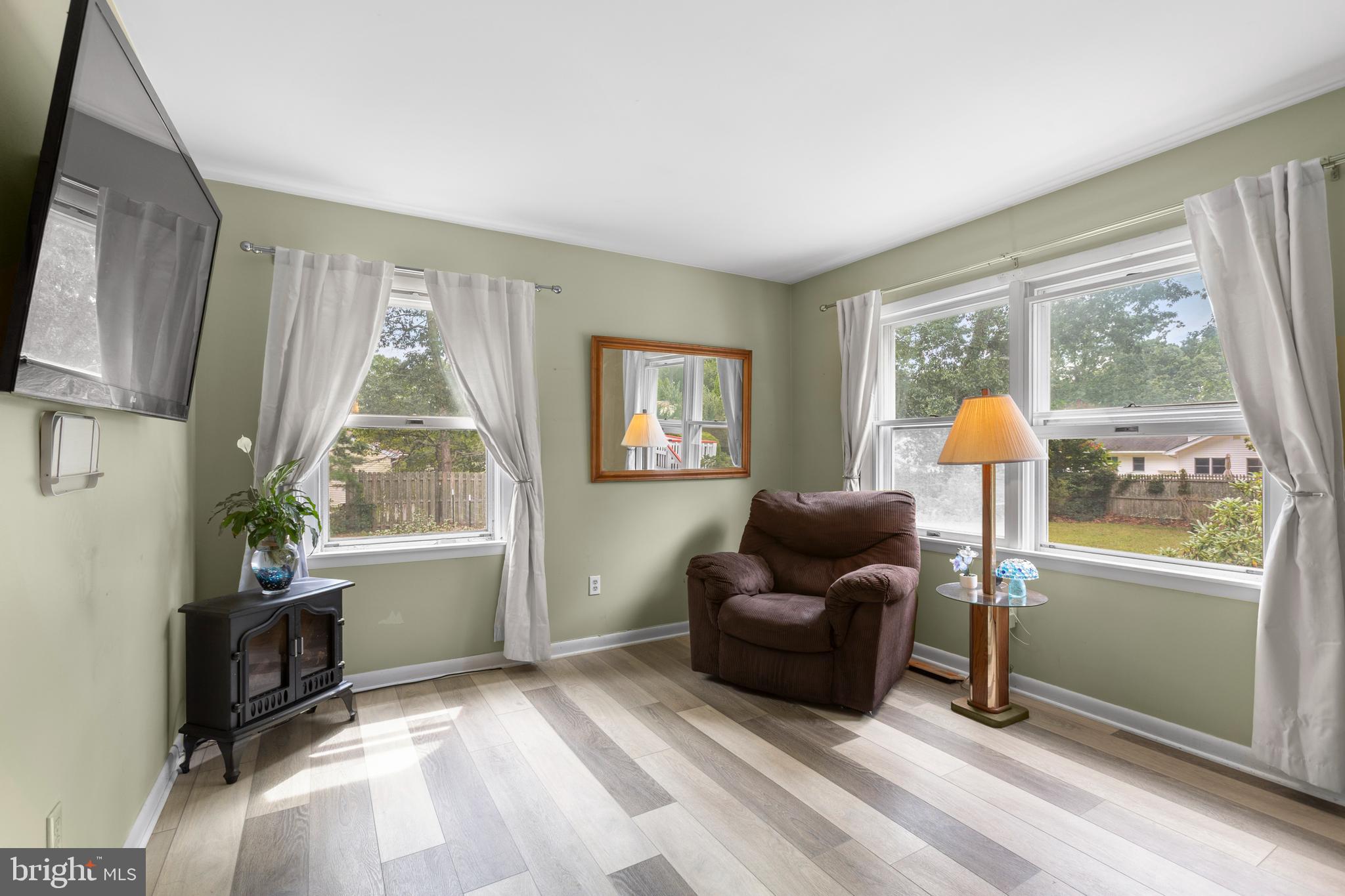 46 Church Road Marmora, NJ 08223 - Photo 18 of 38 a living room with furniture and a window
