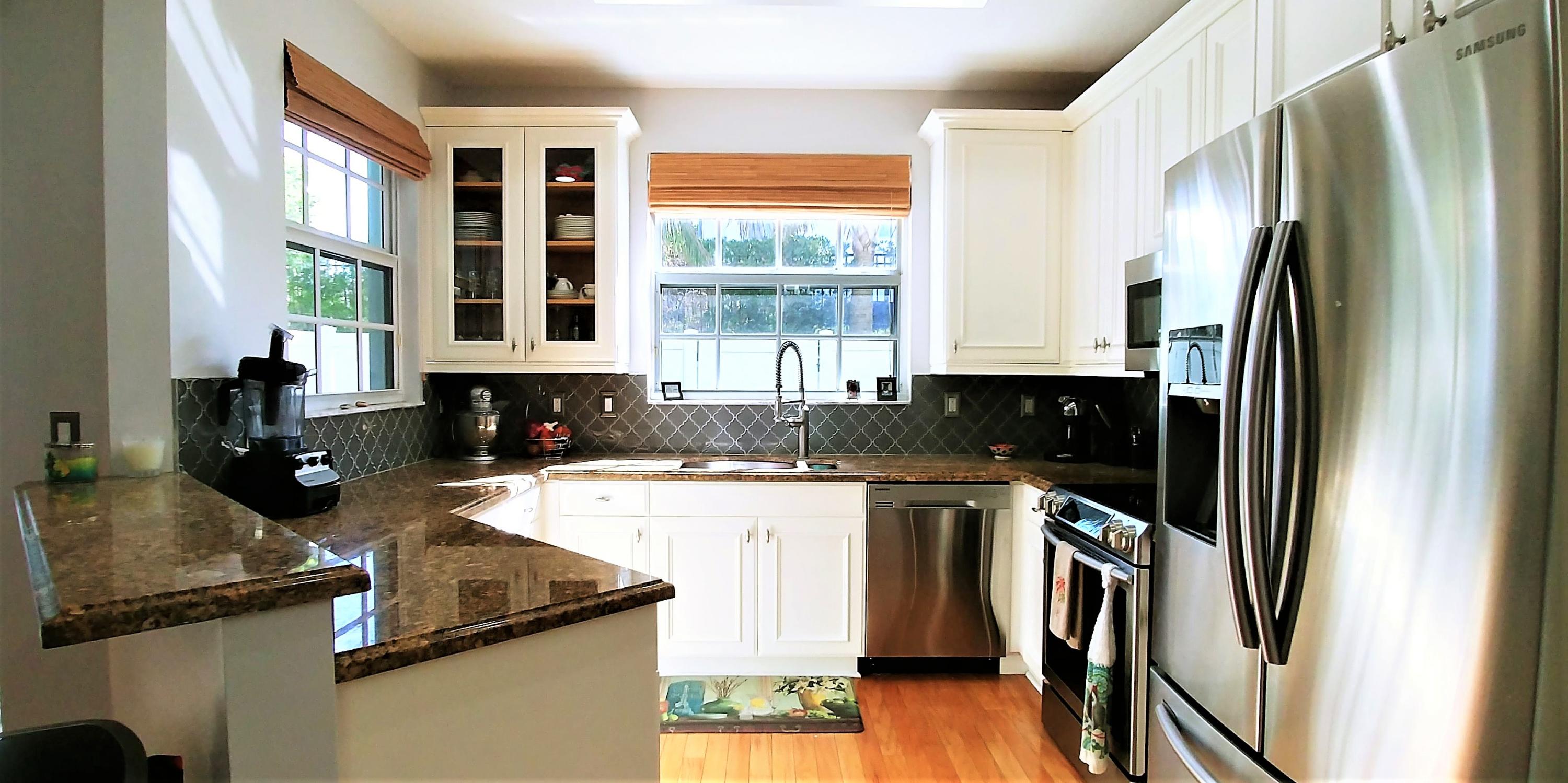 465 Ocean Ridge Way Juno Beach, FL 33408 - Photo 7 of 32 White Wood Cabinetry