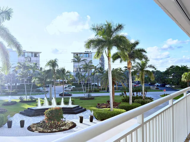 a view of a table and chairs in the garden