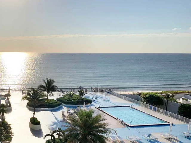 a view of a yard with an umbrella