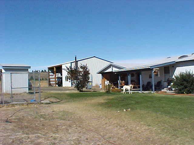 1241 Noye Road Tieton, WA 98947 - Photo 7 of 7 a view of a house with a yard