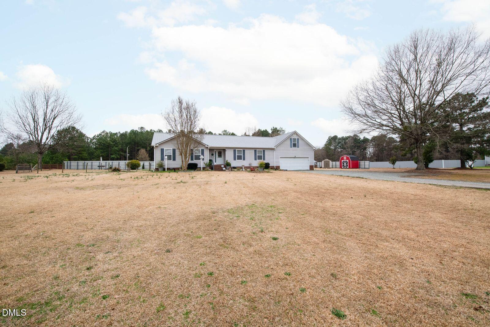 303 Center Church Road Sanford, NC 27330 - Photo 2 of 24 303 front yard