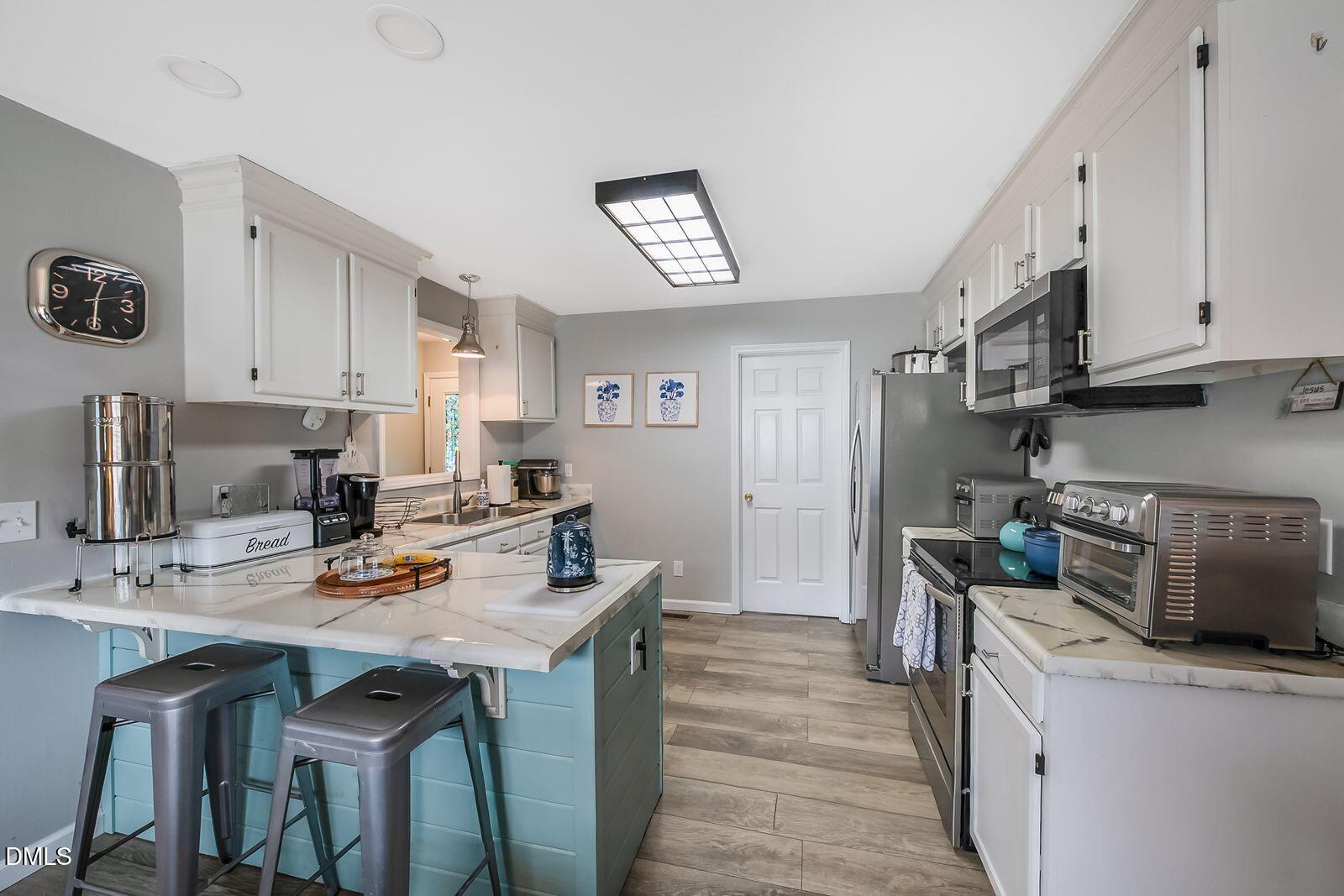 303 Center Church Road Sanford, NC 27330 - Photo 10 of 24 303 kitchen 1