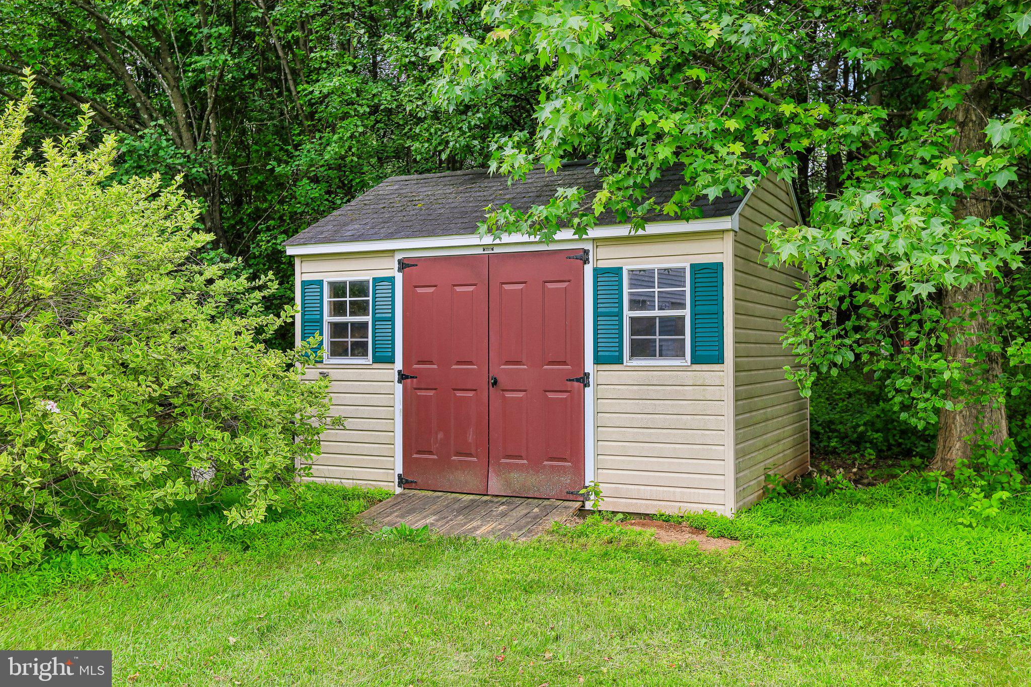 9308 Harrisons Farm Way Gaithersburg, MD 20882 - Photo 67 of 92 Shed for garden tools.